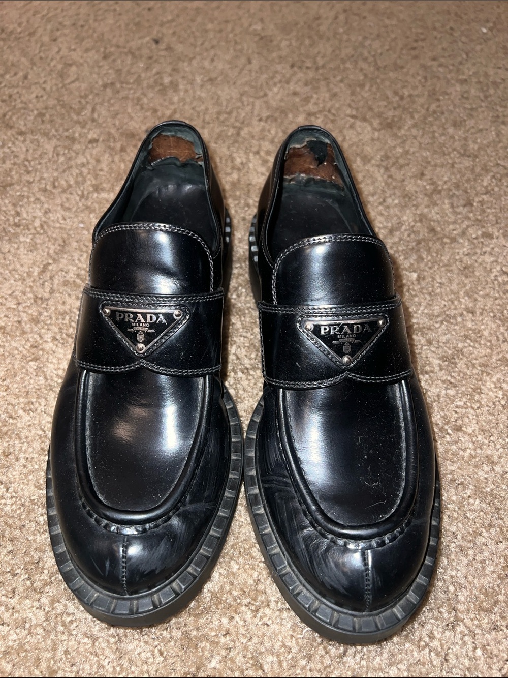 Prada Black Leather Women's Slip-On Loafers with Logo Plaque